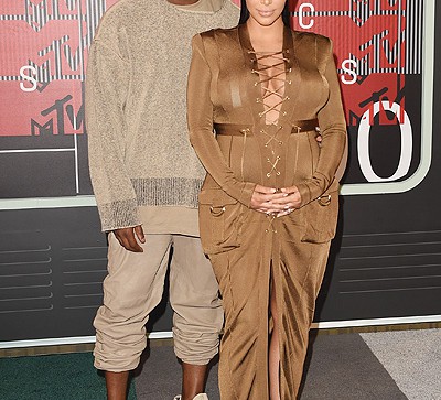 LOS ANGELES, CA - AUGUST 30: Singer Kayne West (L) and TV personality Kim Kardashian attend the 2015 MTV Video Music Awards at Microsoft Theater on August 30, 2015 in Los Angeles, California. (Photo by Jason Merritt/Getty Images)