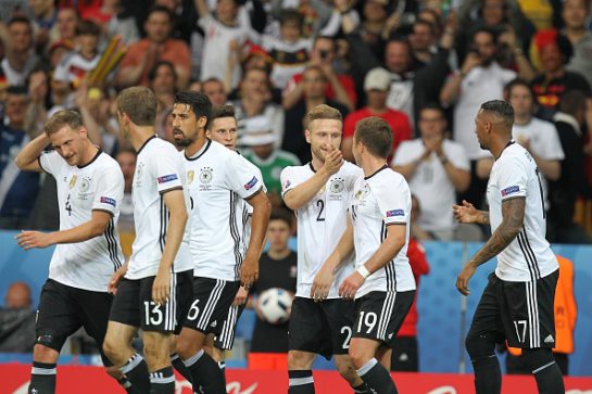 LILLE, FRANCE - JUNE 12: Players of Germany after scoring a goal during the UEFA EURO 2016 Group C match between Germany and Ukraine at the Stade Pierre-Mauroy in Lille, France on June 12, 2016. (Photo by Christian Kolbert/Anadolu Agency/Getty Images)