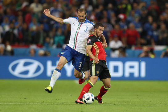 LYON, FRANCE - JUNE 13:  Giorgio Chiellini of Italy vies with Eden Hazard of Belgium during the UEFA EURO 2016 Group E match between Belgium and Italy at Stade des Lumieres on June 13, 2016 in Lyon, France. (Photo by Ian MacNicol/Getty Images)