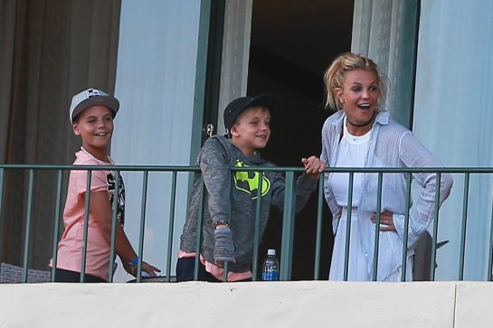 Exclusive... 52143490 Pop star and proud mom Britney Spears is spotted hanging out with her boys Sean and Jaden on their hotel balcony in Hawaii on August 7, 2016. The playful trio could be seen throwing paper airplanes off of the side of balcony. FameFlynet, Inc - Beverly Hills, CA, USA - +1 (310) 505-9876 RESTRICTIONS APPLY: NO USA