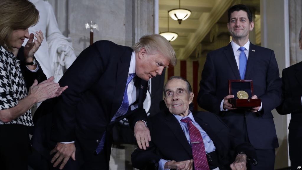President Donald Trump speaks during a Congressional Gold Medal ceremony honoring former Senator Bob Dole on Capitol Hill, Wednesday, Jan. 17, 2018, in Washington. (AP Photo/Evan Vucci)